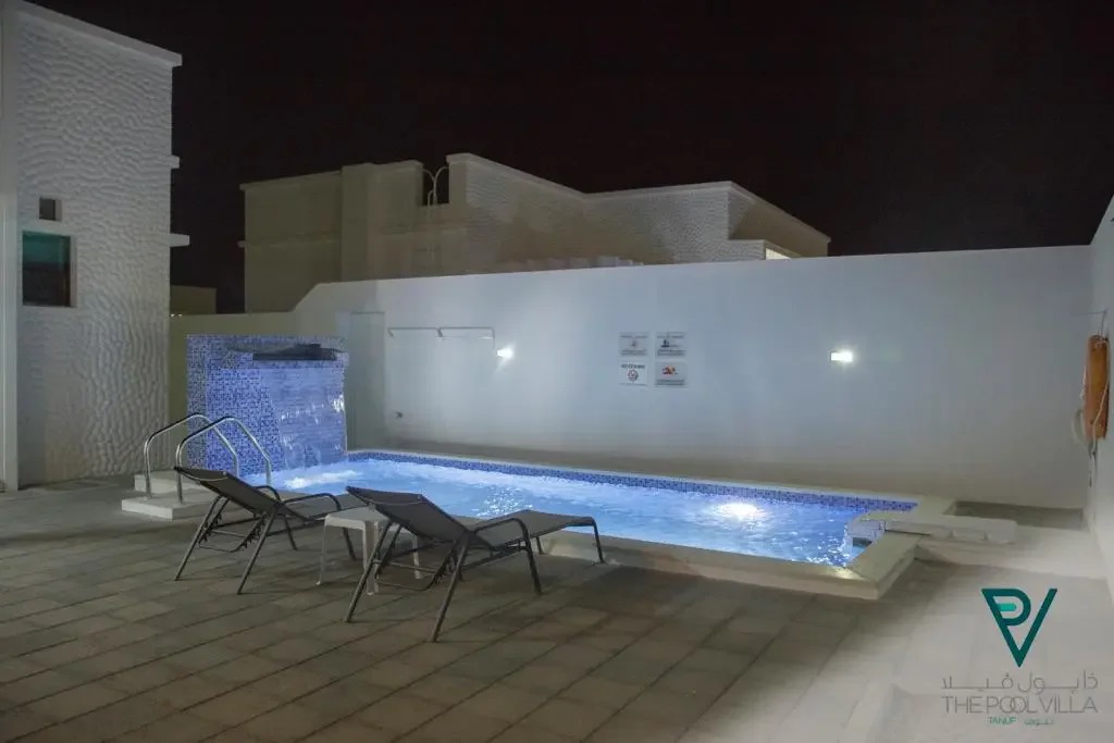 Swimming pool of The Pool Villa at night